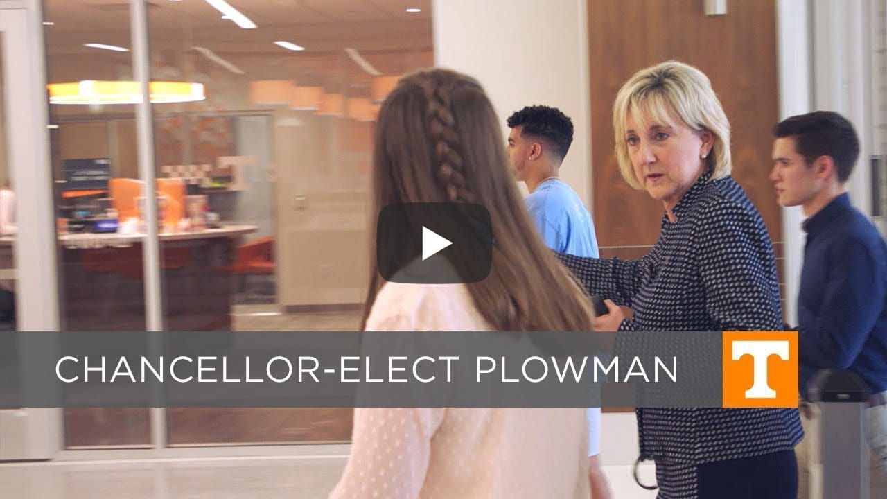 Video still of Chancellor Plowman talking with student