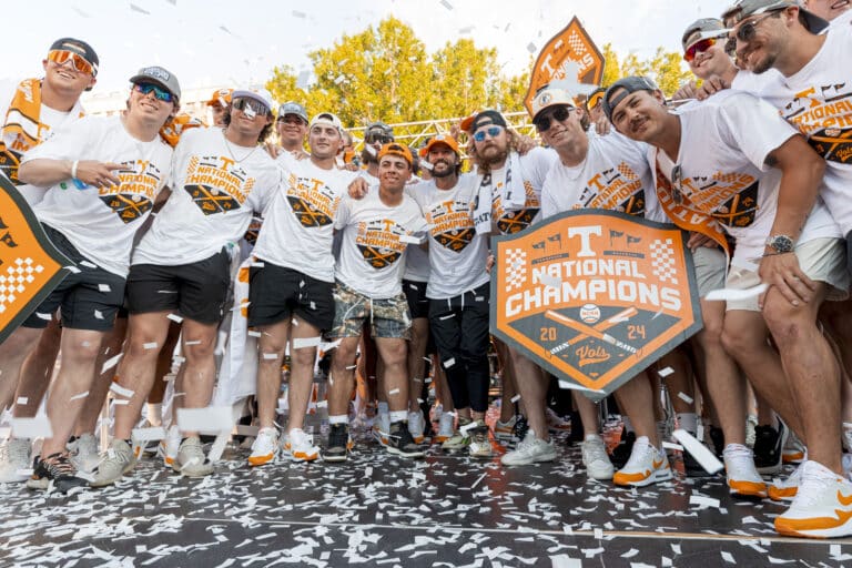 Head Coach Tony Vitello and the Tennessee Volunteers pose with the 2024 NCAA Baseball National Championship sign during a celebration at Market Square in Knoxville, TN.